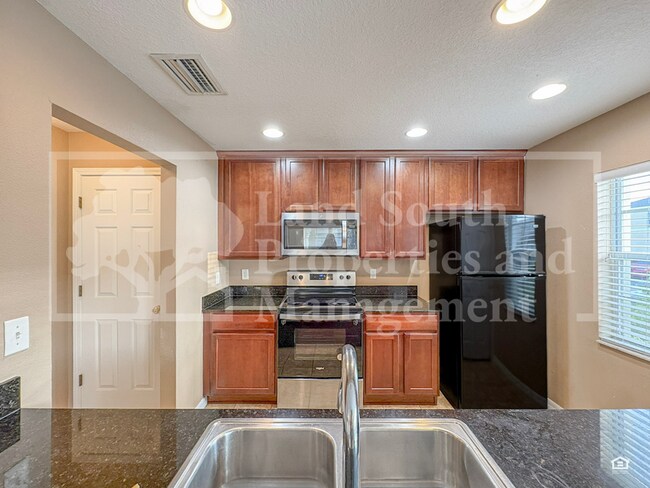 Building Photo - 5432 River Rock Rd