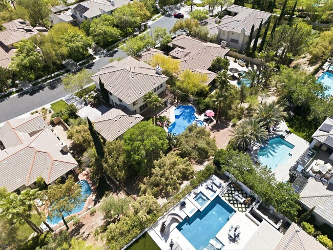Building Photo - Private Gated Christopher Homes Estate in The Vineyards | Resort-Style Backyard & Strip Views