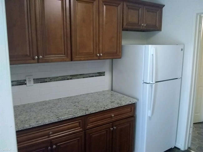 Building Photo - 3 br, 1.5 bath Condo - 7244 Donnell Pl Apt C2