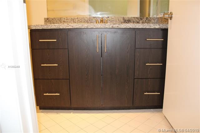 Building Photo - 4680 NW 102nd Ave  104-20