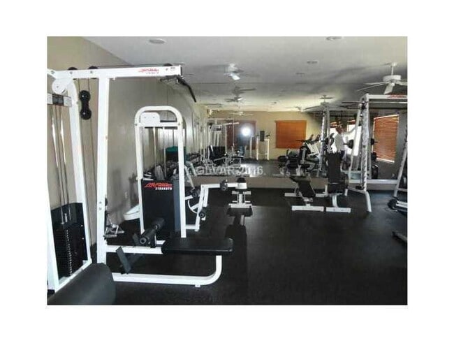 Building Photo - N.W. GATED COZY CONDO W/ COMMUNITY POOL AND SPA