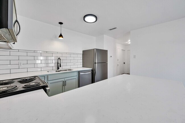 Building Photo - 5311 Tennyson Dr