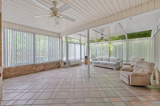 Building Photo - Spacious 3BR Retreat with Soaring Ceilings & Screened Porch