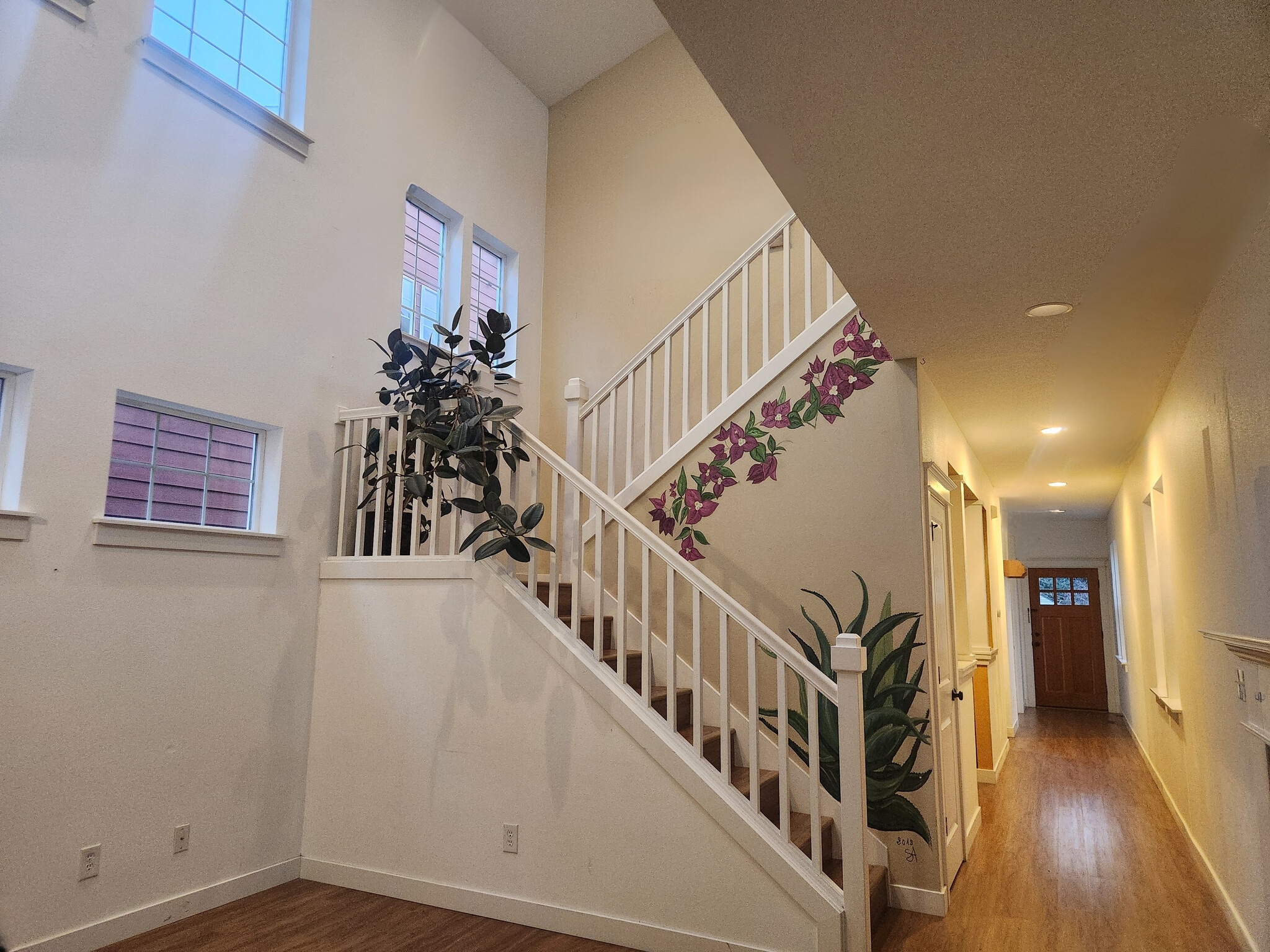 View from the kitchen looking up at the 20 foot ceiling with 2 skylights - 7727 N Kellogg St