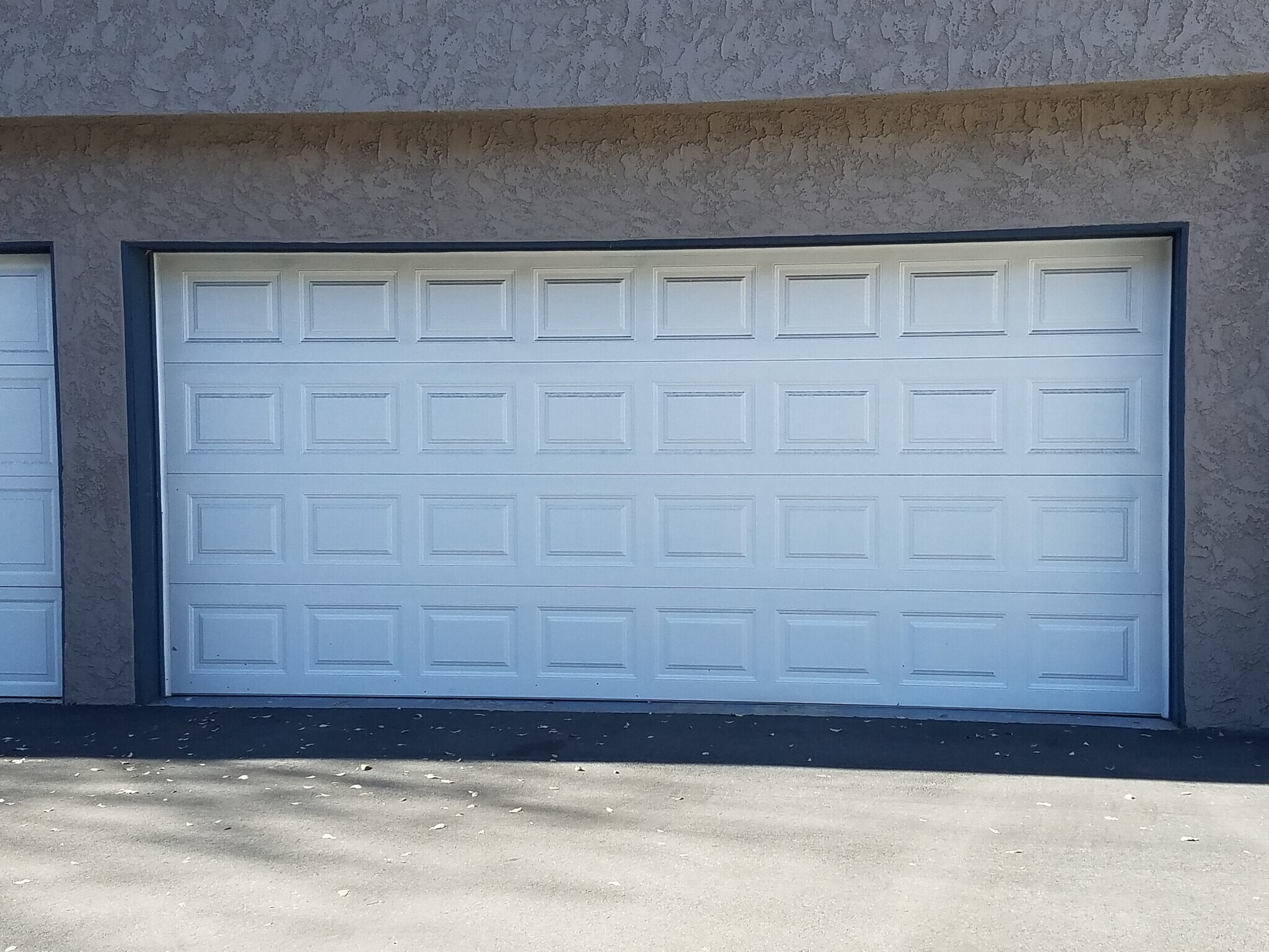 2-car garage with garage door opener - 17 ft wide - 725 Windwood Dr