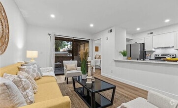 Building Photo - Welcome to this darling, turnkey condo loc...