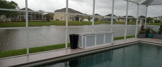 Building Photo - Beautiful Port Orange 4 Bedroom 2 Bathroom Pool Home