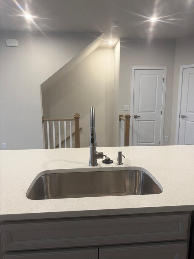 Building Photo - Brand New 3-Story Townhome with 2-Car Gara...