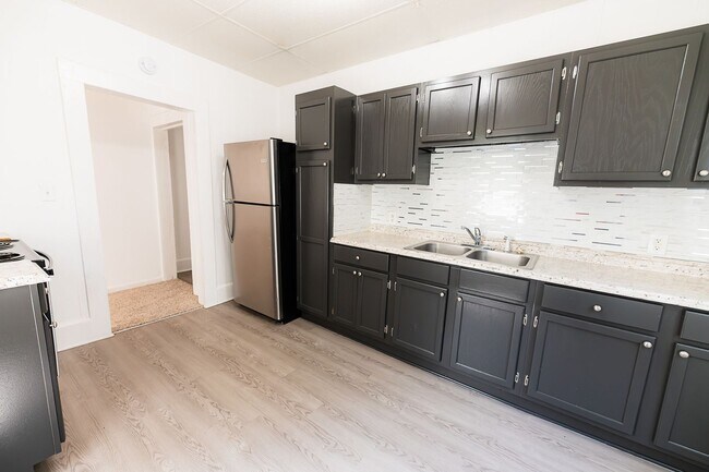 Building Photo - Move-In Ready 4BR Home with Large Backyard