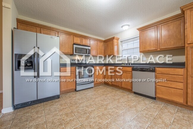 Building Photo - 5264 Brassie Dr