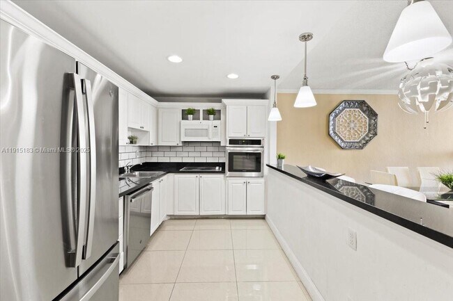 Building Photo - 19380 Collins Ave