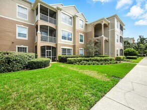 Building Photo - Bright Top-Floor Condo in Resort-Style Gated Community