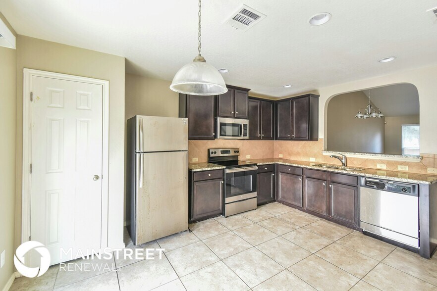 Building Photo - 8903 Scarlett Pl