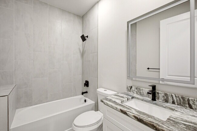 Building Photo - New 3/2 Pool Home for Rent on Canal, Fenced Yard, Pets Welcome. Your Dog Approves of This Backyard