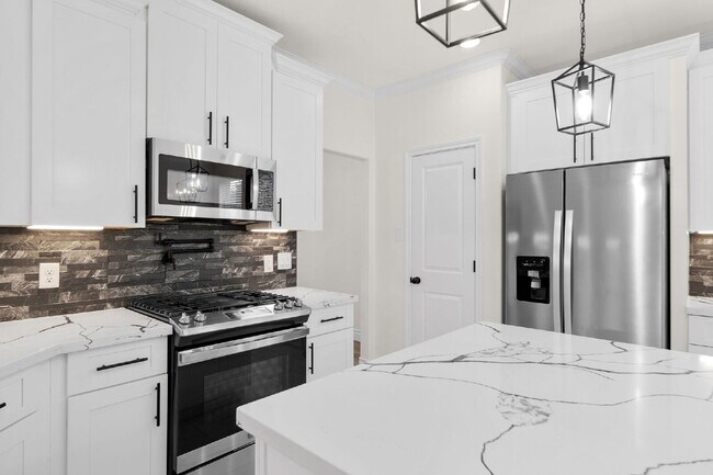 Building Photo - This is more than just a place to live - it's a place to feel at home.