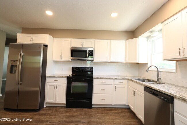 Building Photo - 6810 Village Green Blvd