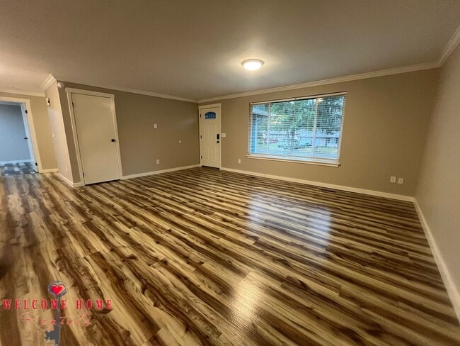 Building Photo - Remodeled rambler, no carpet, with HUGE fenced yard!!