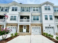 Building Photo - Practically New & Available NOW! Americana...