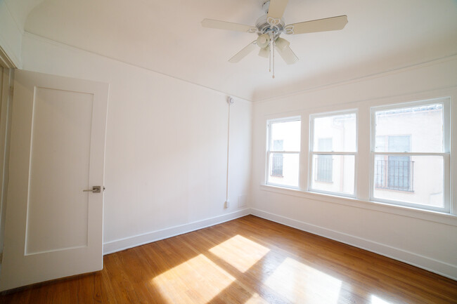 Building Photo - A Grand, Light-Filled 1-Bedroom with Bonus...