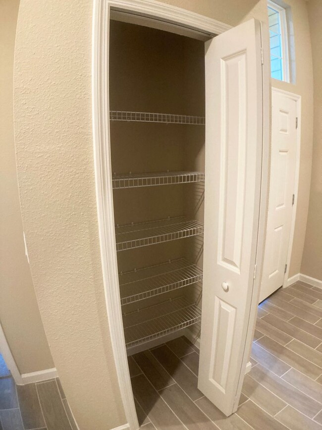 Building Photo - Your Private Escape with High-End Finishes...