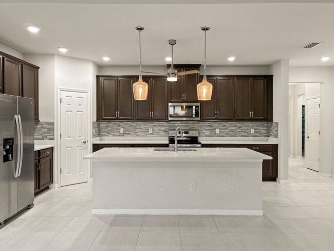 Building Photo - $1,500 OFF on Your 2nd Month’s Rent! Riverview Gem – 4BR/2BA Home with Screened-In Hot Tub & Solar!!