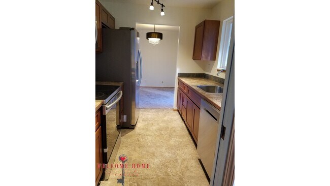 Building Photo - Beautiful Remodeled Rambler!!!  Come enjoy this HUGE backyard!!  NEW CARPET!!