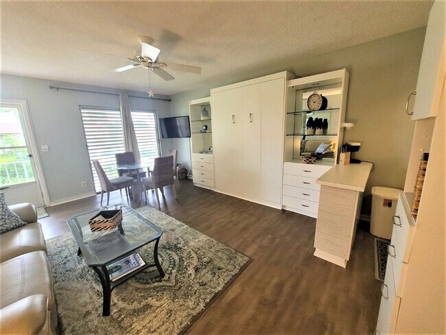 Building Photo - Renovated Efficiency Unit at Aquarius of M...