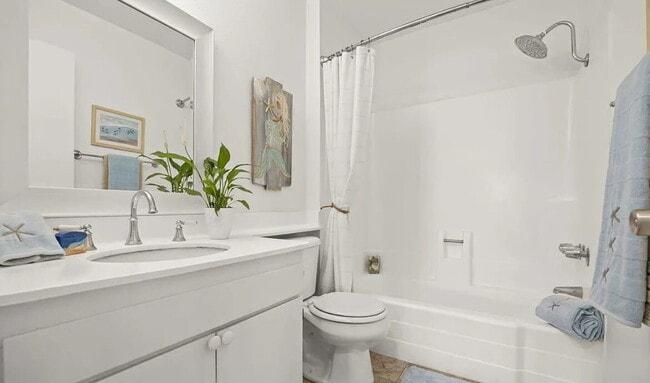 Building Photo - charming one-bedroom, one-bath retreat nestled in a serene beachside community