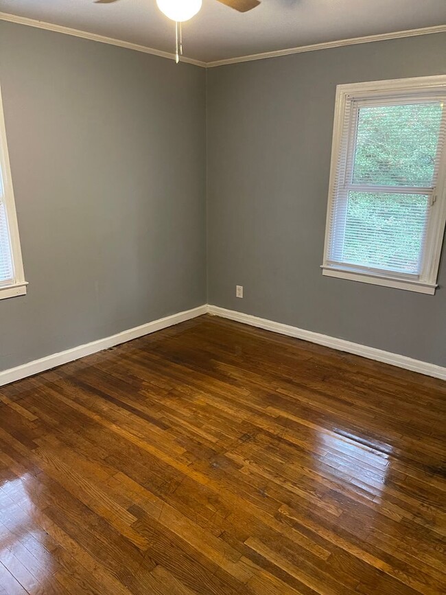 Building Photo - 3bed house in the county! Central all electric hvac, laundry, yard and hardwoods.