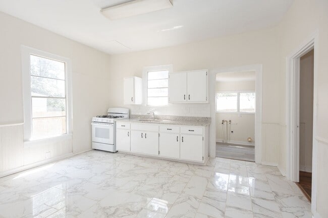Building Photo - Move-In Special: Get 50% OFF Your First Month's Rent!