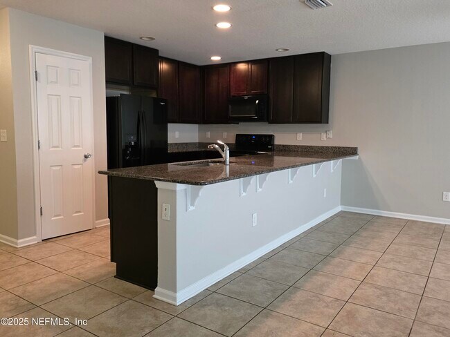 Building Photo - 6553 Winding Greens Dr