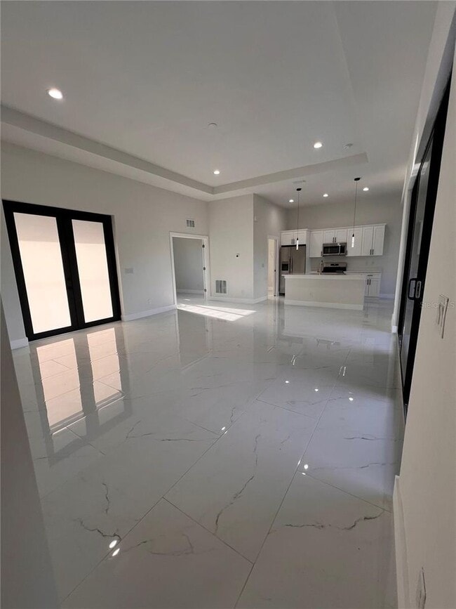 Building Photo - Be the first in occupy this 2025 constructed home in the vibrant city of Port Charlotte, FL! Qual...