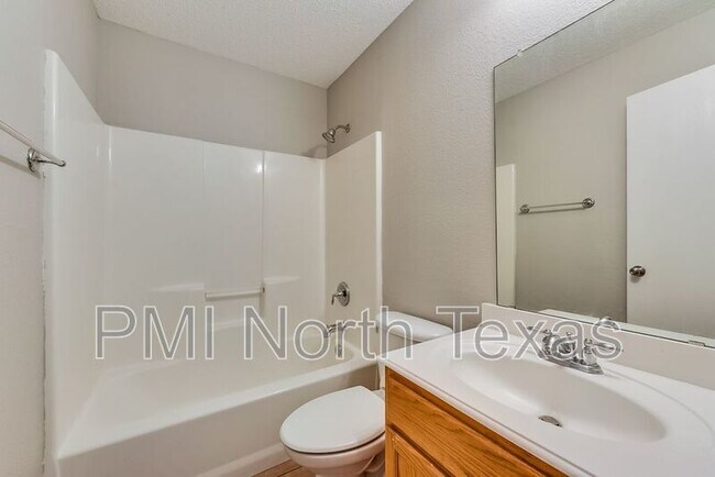 Building Photo - 9957 George Bush Dr