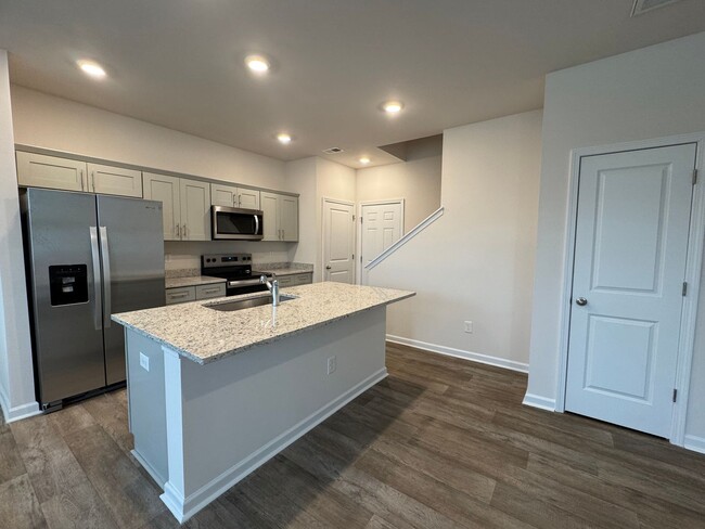 Building Photo - Brand New 4BR 2.5BA Townhome