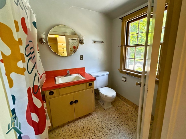 Building Photo - Charming 4 Bedroom Home with Hardwood Floors, Gas Fireplace & Large Fenced Yard