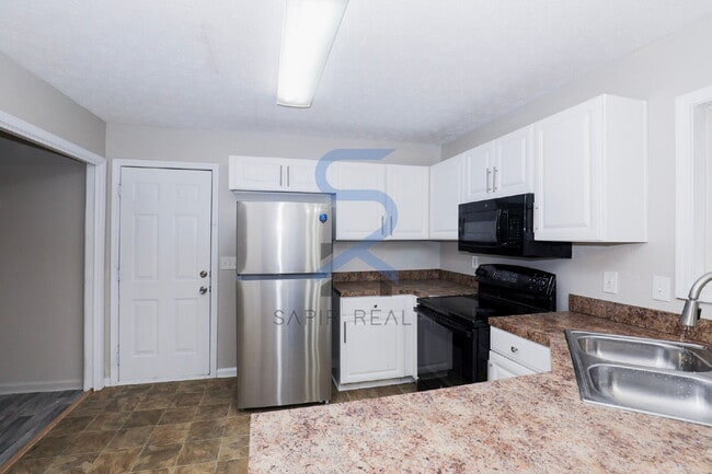 Building Photo - Move in before January 31st and choose your reward: a $250 Amazon Gift Card or a 55" Smart TV!