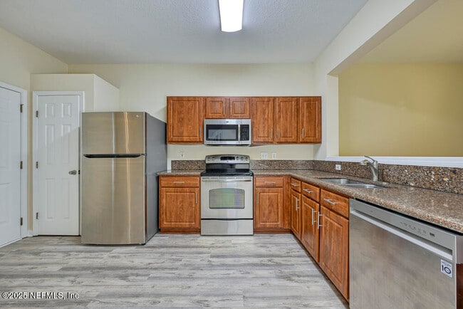 Building Photo - 7546 Scarlet Ibis Ln