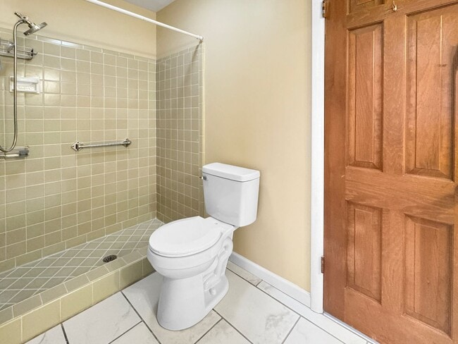 Building Photo - Spacious 3 Bed/3 Bath Midtown Home with Oversized Garage, Large Deck, and Storage Shed