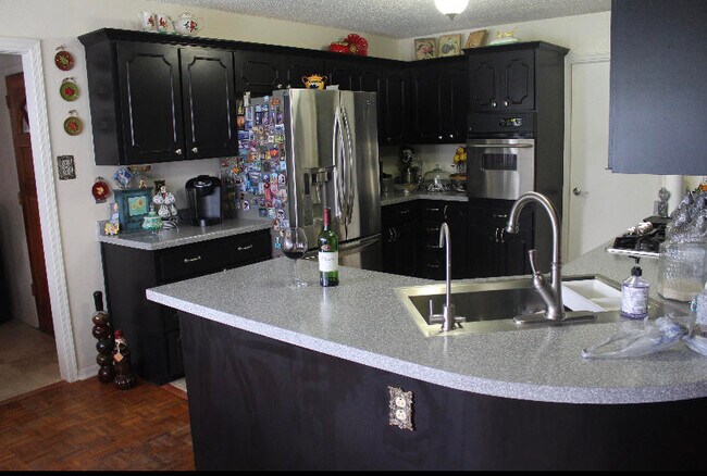 Building Photo - 8812 Cosmos Ave