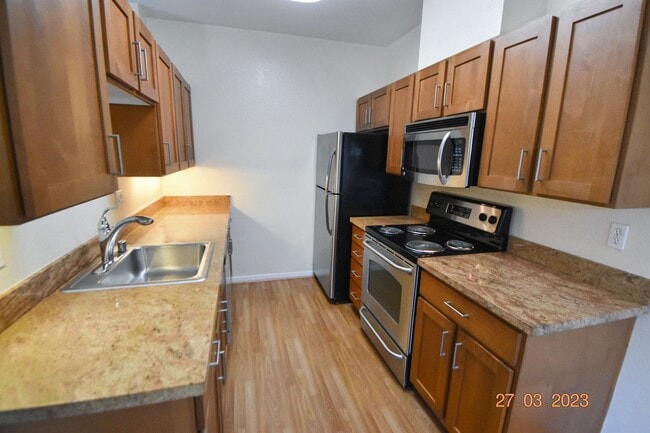 Building Photo - Beautiful and Quiet Gated Community steps from the Marina!