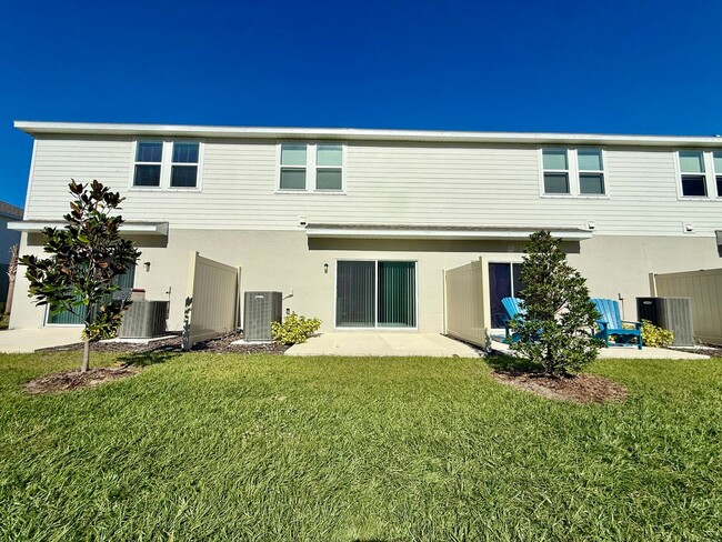 Building Photo - Riverside living redefined - 3Bedrooms/2.5Baths newly built townhome in Edgewater!