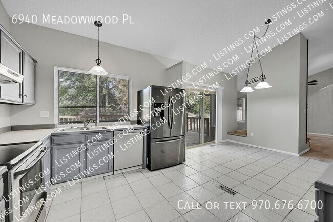 Building Photo - 6940 Meadowwood Pl