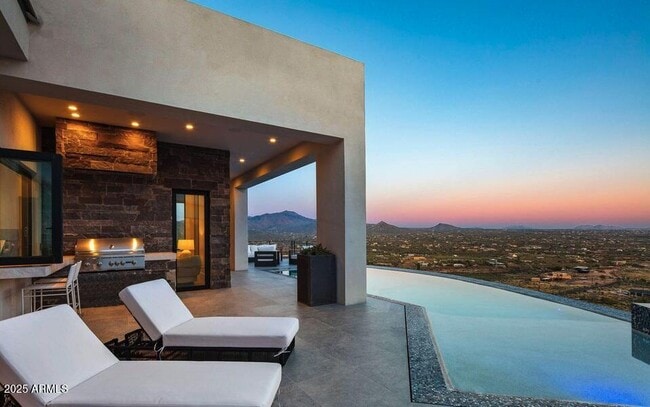 Building Photo - 4880 E Lone Mountain Rd N