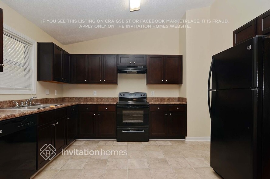 Building Photo - 6712 Songwood Dr