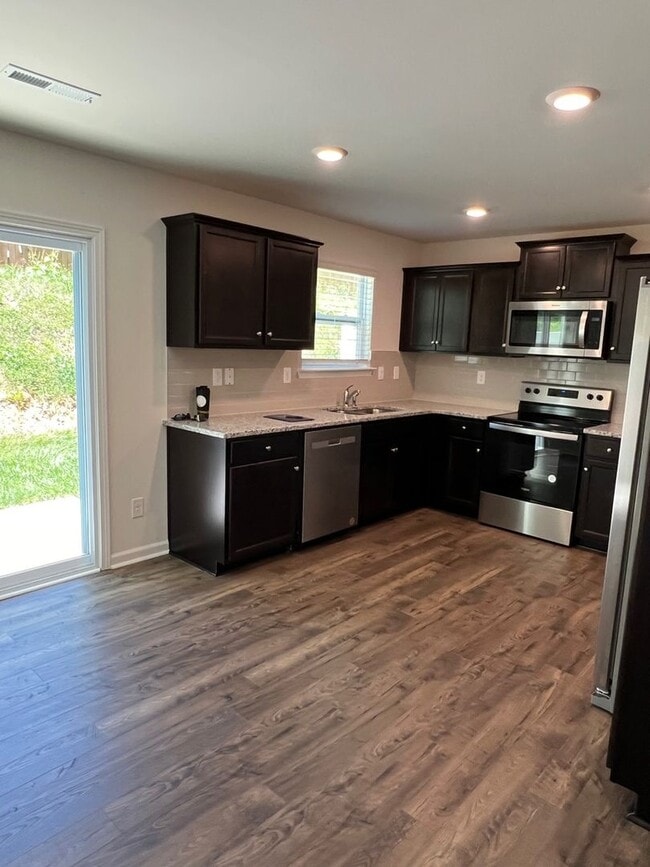 Building Photo - Pristine 3BR Townhouse in Arden