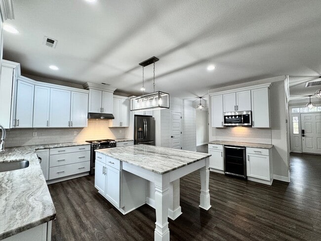 Building Photo - Farmhouse-style Home - Ready NOW in Pungo! A First Time Rental with a HUGE Fenced Yard, Attached ...