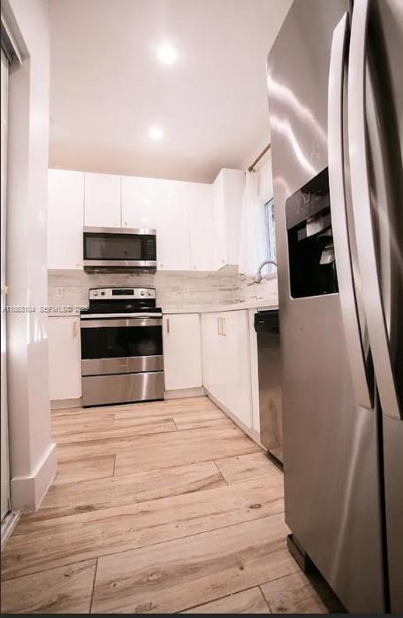 Building Photo - 1112 NE 41st Ave