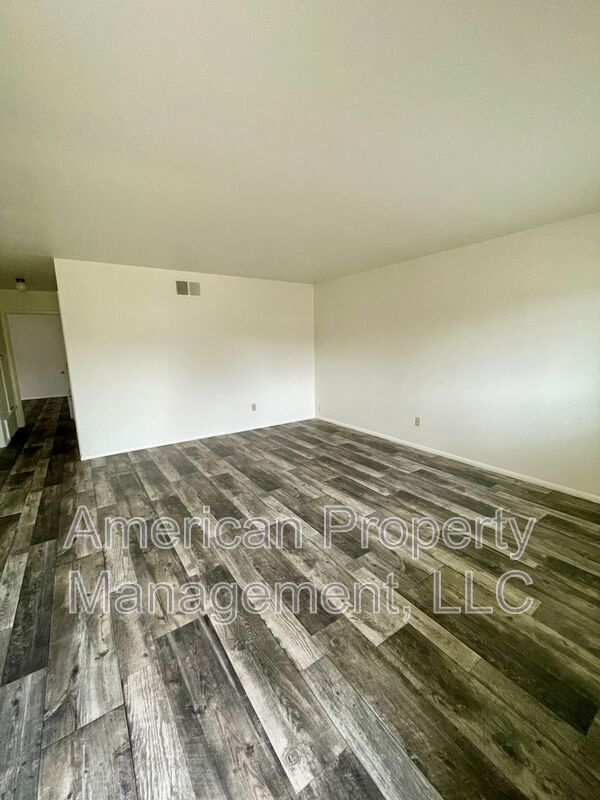 Building Photo - 1585-P1585 S 67th E Ave