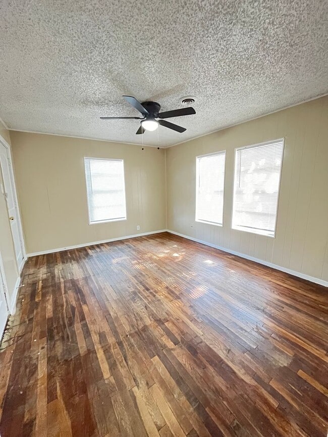 Building Photo - Denton Charmer with Big Yard, Carport & Flexible Living Space