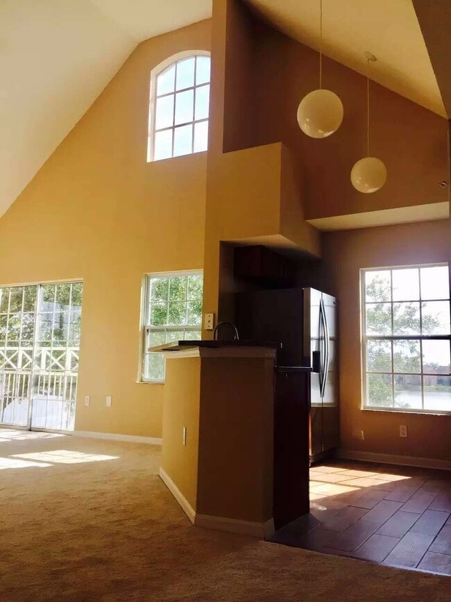 Building Photo - Water view condo with garage in sought after westchase